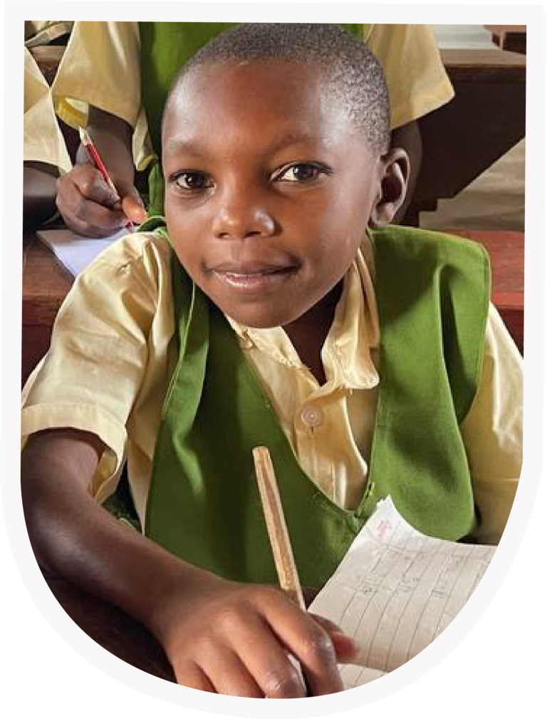 A Maisha School student writing in class